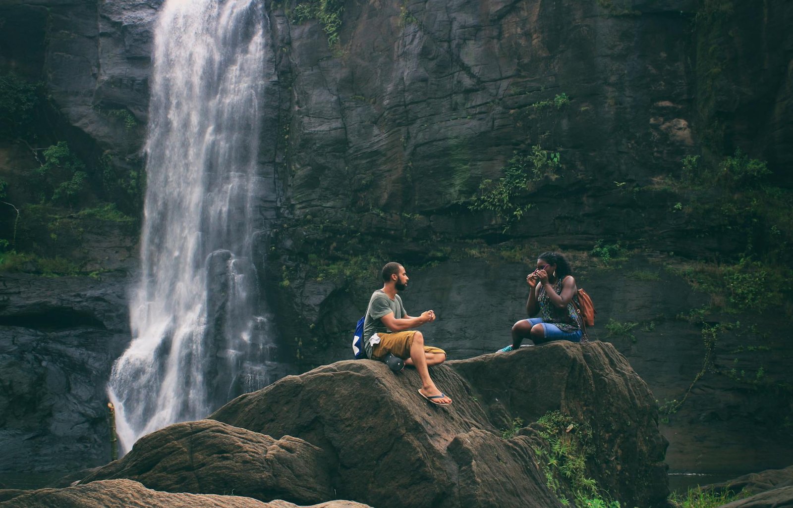 Ex - Behavior - man and woman near waterfall man and woman near waterfall
