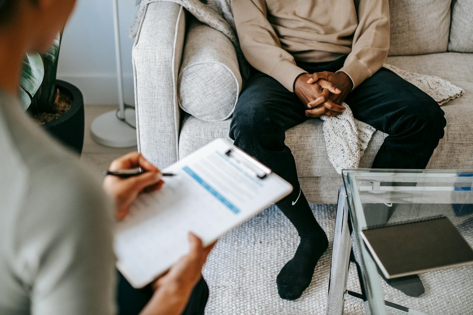 Types of Therapy - Mental Health - crop ethnic client discussing problems with anonymous psychologist crop ethnic client discussing problems with anonymous psychologist